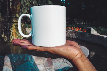 Hands holding a white mug, a quiet moment before reaching out for support